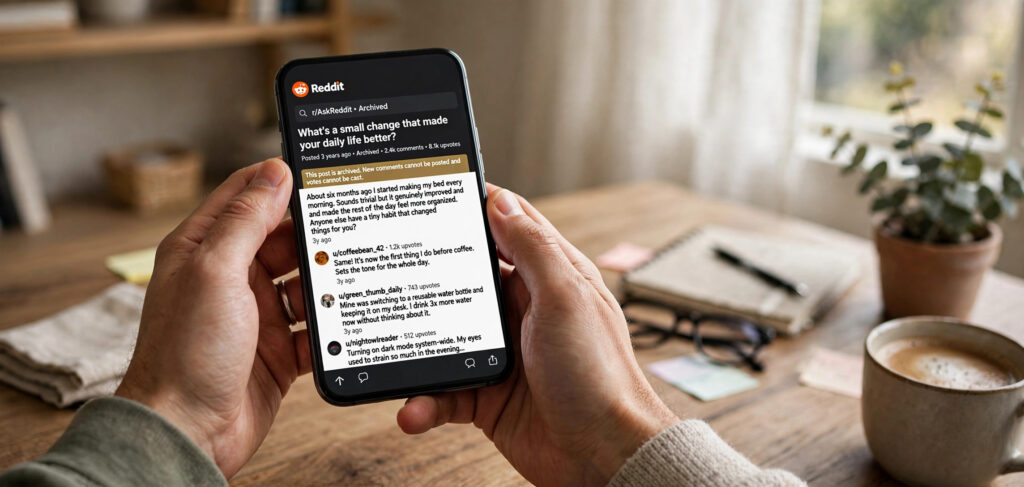 Person checking a web archive to read a deleted Reddit comment on a smartphone