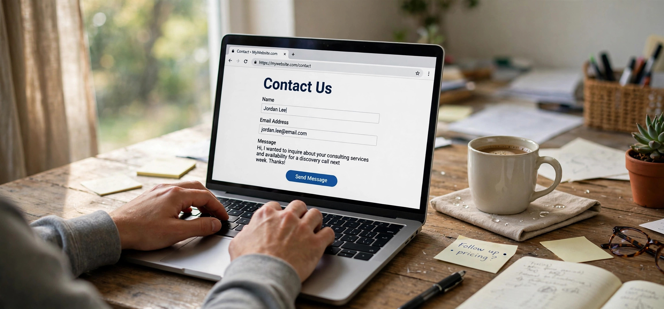 Laptop showing an HTML contact form on a website with a person typing, contact form without backend